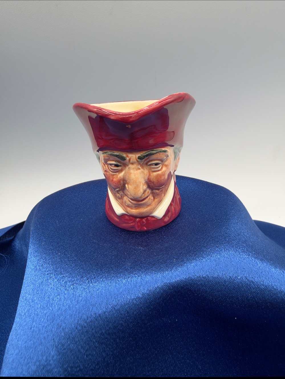 "The Cardinal" miniature character jug mfg. by Royal Doulton. 2.25” version.